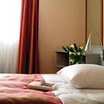 Отель Nh Nuernberg 4*